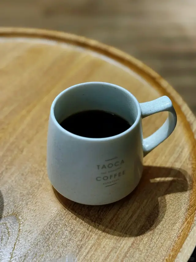 印着TAOCA的咖啡杯